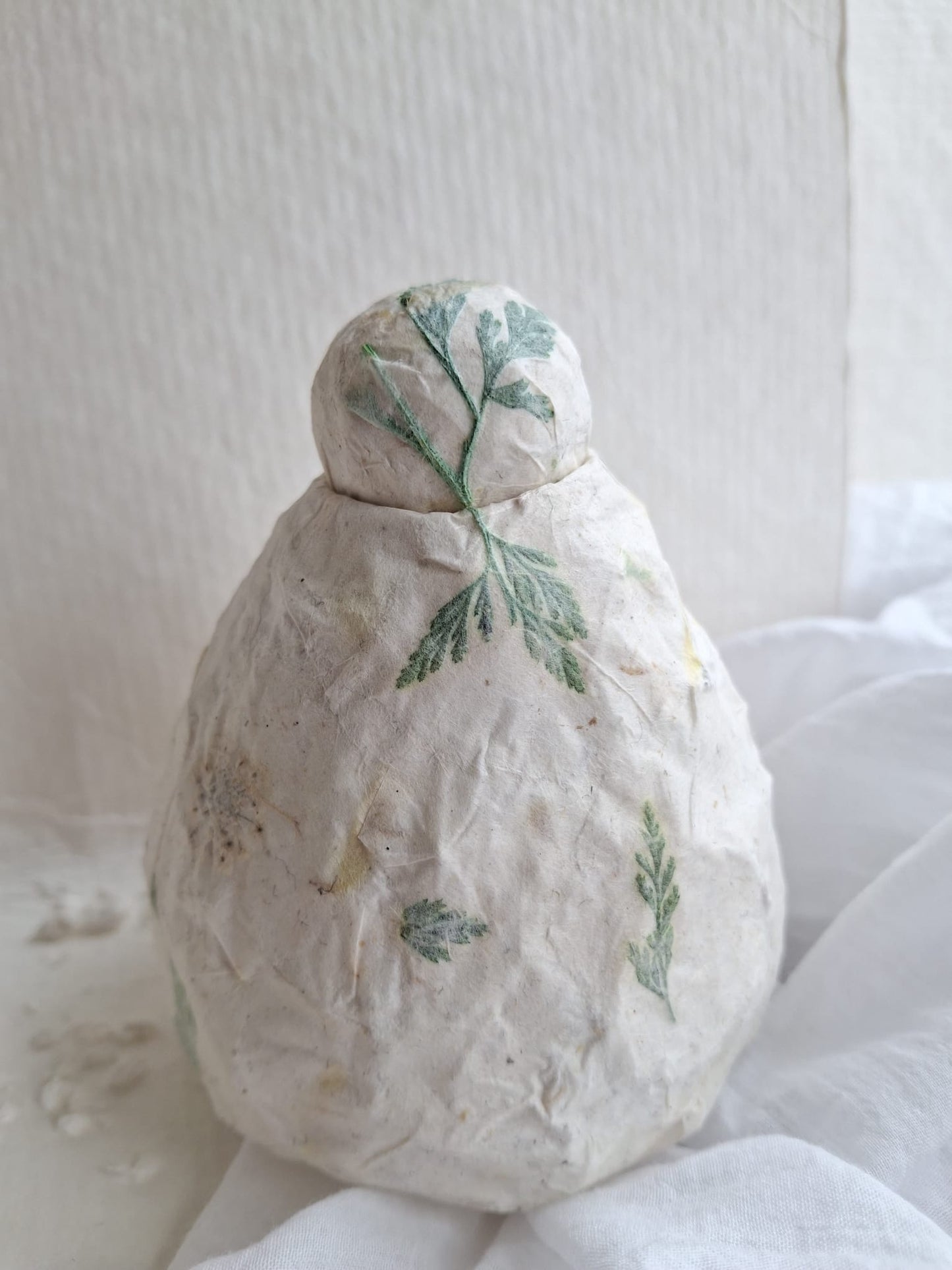 Urn blad en bloem
