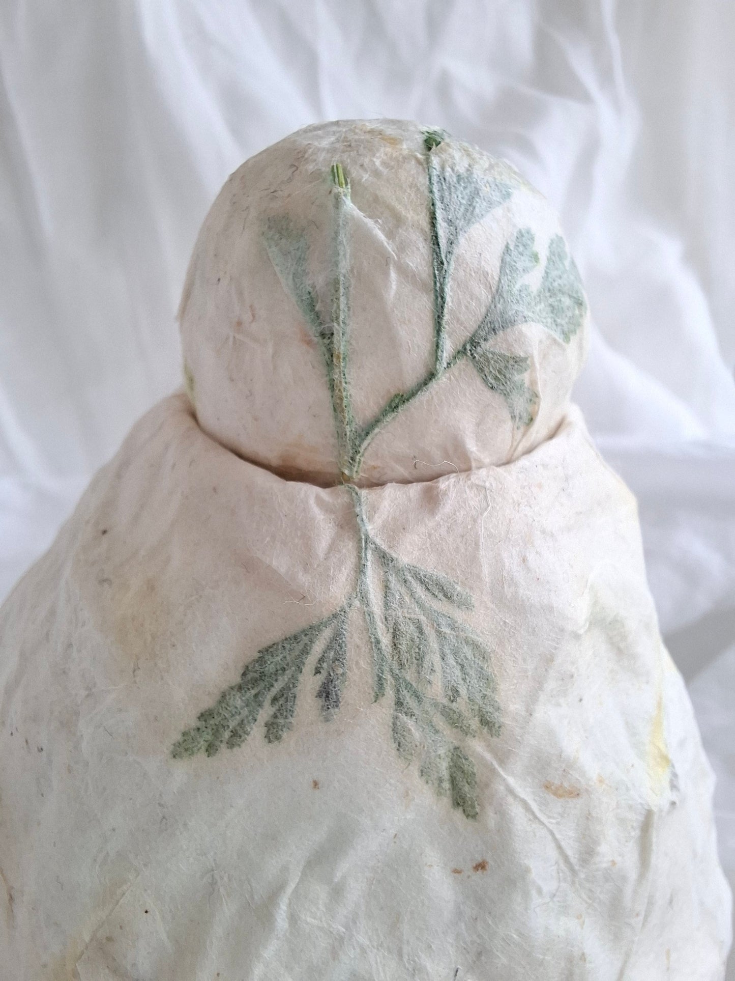 Urn blad en bloem