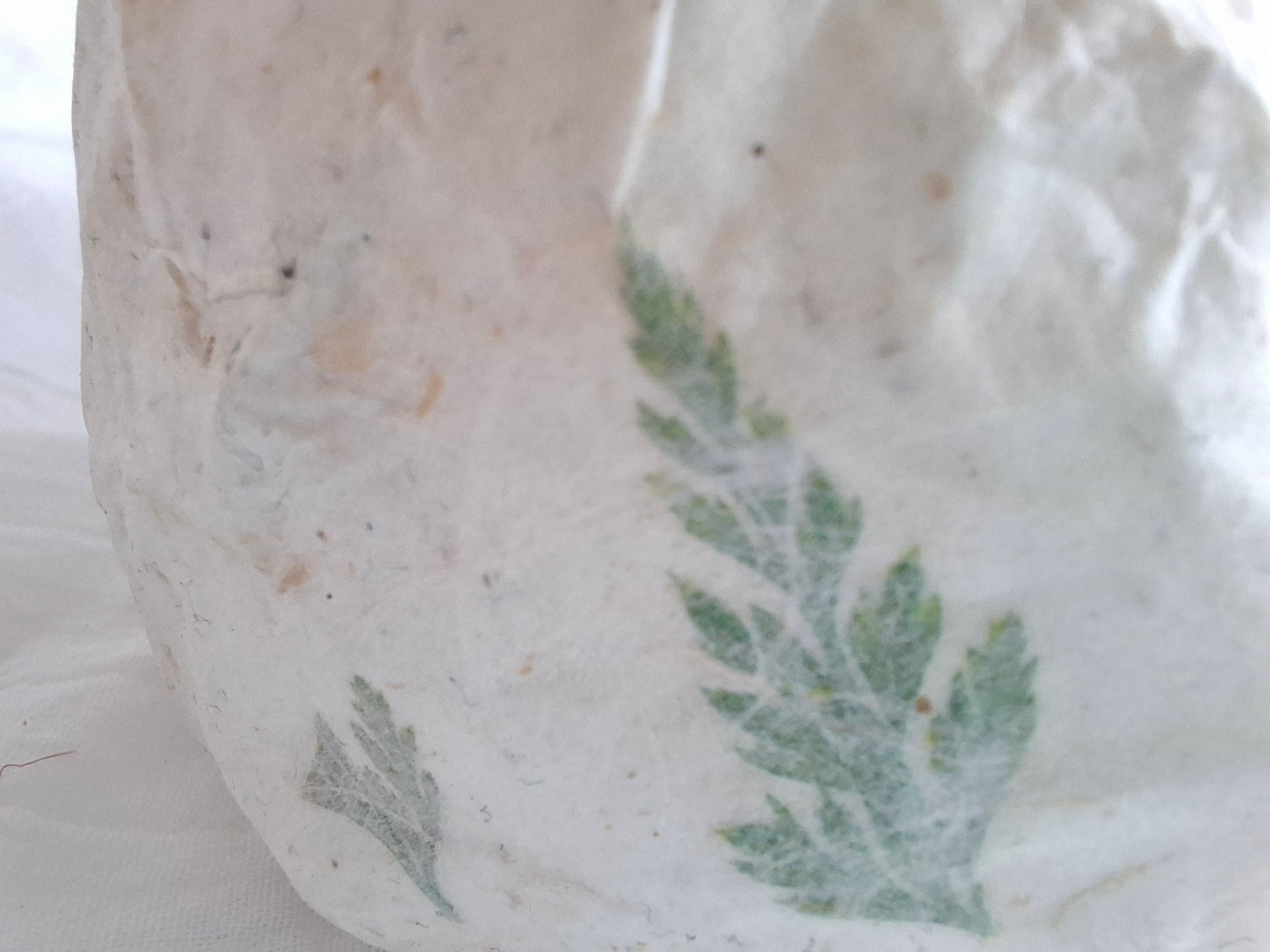 Urn blad en bloem
